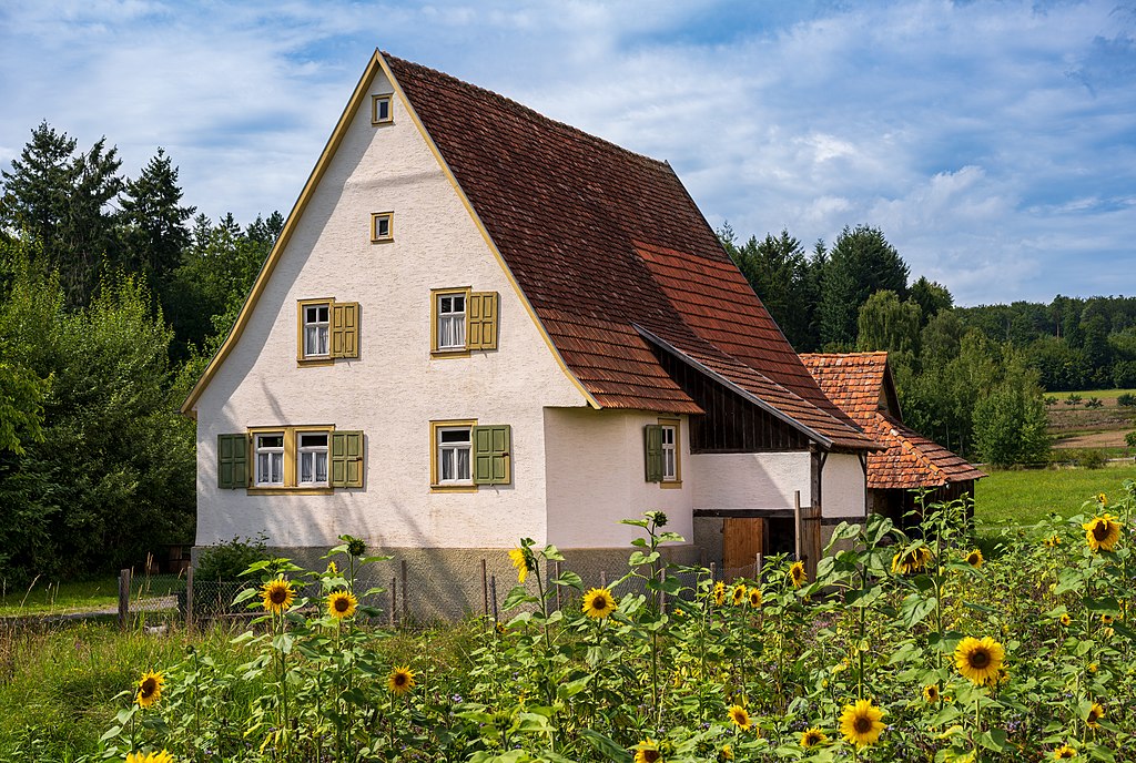 Farmhouse with sunflowers